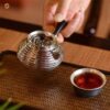 Ấm trà bạc chế tác thủ công tinh xảo ATB103